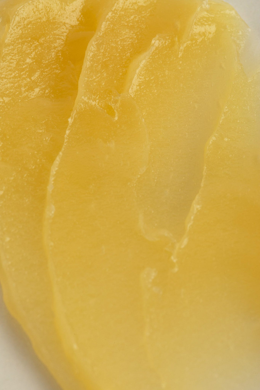 Close-up of the waterless balm texture of Melrose Relieve CBD cream