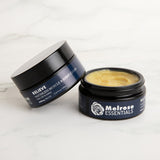 Two jars of Melrose Essentials CBD cream on a light background